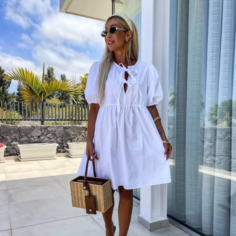 Trendiges einfarbiges Damenkleid mit Fliege vorne und Puffärmeln