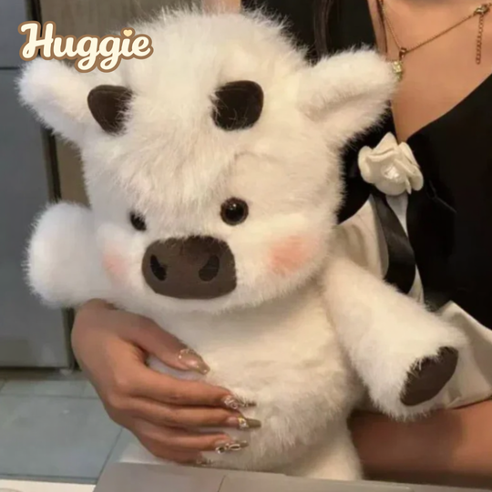 Huggie ® Peluche de vaca corredora