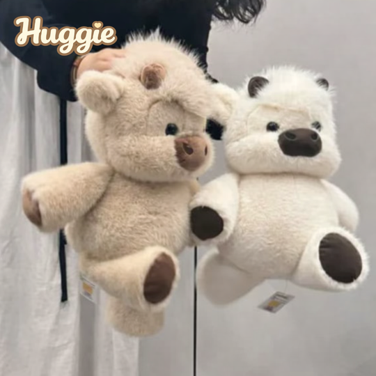 Huggie ® Peluche de vaca corredora