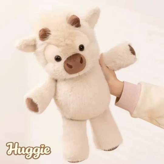 Huggie ® Peluche de vaca corredora