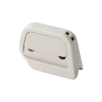 Einziehbarer Kartonschneider mit Sicherheitsmechanismus